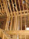 Ductwork running through my closet, through Kailyn's closet, and up to the attic
