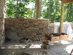 Patio interior wall, and the stone selection bench in front of it