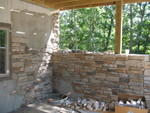 Showing the intersection of the house wall and retaining wall