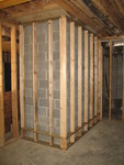 Framing around the masonry heater foundation