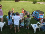 All of the kids blowing bubbles