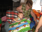Birthday girl opening gifts