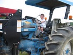 Connor on Mr. Bishop's tractor
