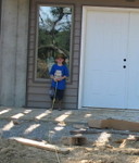 Connor measuring the house for us
