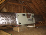 Air handler / geothermal unit for the upstairs, situated in the attic above Connor's room.