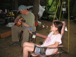 Kailyn listening to Willie playing the guitar
