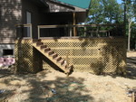 Deck stairs and lattice, also showing doors