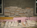 Stonework starting, though this pic doesn't do it justice. It looks much better in person, or maybe they improved their technique after I took this pic -- this was the very first bit tackled.