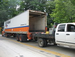 They shipped our bathtub in a 53-foot box tractor trailer!  He couldn't manage the country roads (and kept getting lost, anyway), so Jimmy and I drove out to the county line to meet him and transfer the tub to Jimmy's truck.