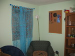 Kailyn's reading corner with her curtains and bulletin board up