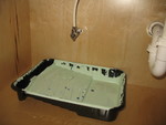 Then we'll tackle this leak, which I discovered when I went to get towels out to clean up the drips from the first leak!