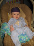 A rather tired and grumpy Brianna  modeling the hat