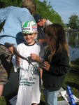 Enjoying the attention of the adorable little girl who was fishing next to us