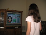 We surprised the kids with a Wii in lieu of a family vacation this summer.  Kailyn creating her Mii