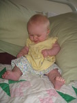 June 18: Brianna is endlessly fascinated by trying to pick the flowers off of her pants when I put her in this outfit.