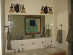 June 23: Freshly installed master bathroom mirror (with handprints still all over it, oops.)