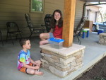 Connor, Kailyn, and a grasshopper
