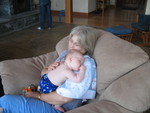 After skipping her morning and afternoon naps, here she is finally crashing on mom around 5:30pm.