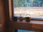 A cute little arrangement of baskets on the windowsill (mom's doing -- I wouldn't have thought of just setting them around like this, serving no particular purpose)