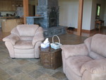 Chairs and side table. The basket holds board books for Brianna