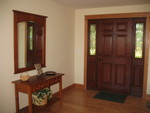 Entry hall, with the addition of a small basket to the table display. Don made this basket a couple of years ago.