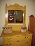 Brianna's dresser.  The basket on the left holds her Fuzzi Bunz, and the one on the right has toys.