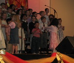 Then on to preschool graduation! They started with singing songs for us...