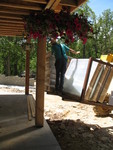 Unloading windows onto the porch