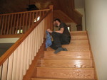 Don continuing to work on the stair rail