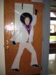 Photo of principal Larry Sparks on cutout on office door