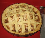 Apple pie decorated with tiny little piecrust leaves