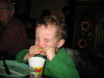 Connor eats his lemon wedge (from the garnish) at dinner. Despite the face he's making here, he ate the whole thing!