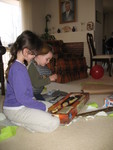Opening another gift: cap guns from grandma and grandpa