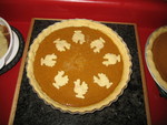 November 23: Thanksgiving day!  A pumpkin pie I decorated with piecrust turkeys