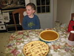 He's excited -- now the pies have made it to the kitchen table!
