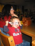 Connor wearing his rainbow glasses at the light show
