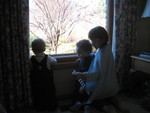 Ben (left), Connor, and Kailyn share a quiet early-morning moment of bird watching