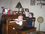 Ben and Connor playing the piano together