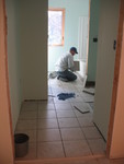 October 1: Tile being laid in the upstairs bathroom