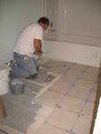Tile installation in downstairs bathroom