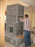 Ken applying the final layer of stonework