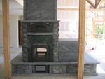 October 3: Finished masonry heater! Kitchen side