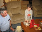 Dad showing Connor a model airplane