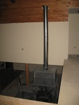Stovepipe going up into the ceiling