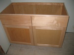 Downstairs bathroom cabinetry. This one has a problem -- the left door really doesn't seem to match the rest of it at all.