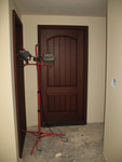 Downstairs door stained (this one is for the closet, but the one to the mead storage room matches)