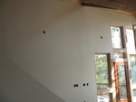 This wall is painted now, but has an odd gray smudge on the way up the stairs