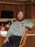 Don relaxing by the kitchen