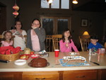 Everyone enjoying birthday cake